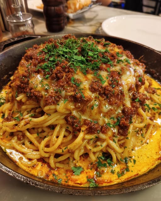 Cajun Beef Spaghetti with Creamy Three-Cheese Parmesan Sauce