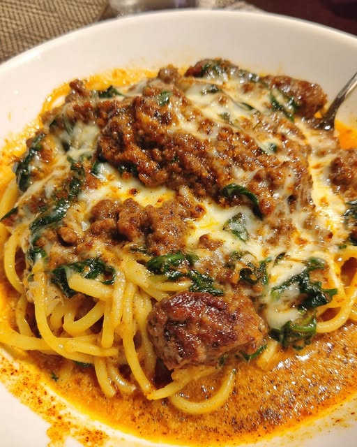 Cheesy Garlic Butter Spaghetti with Italian Sausage & Spinach